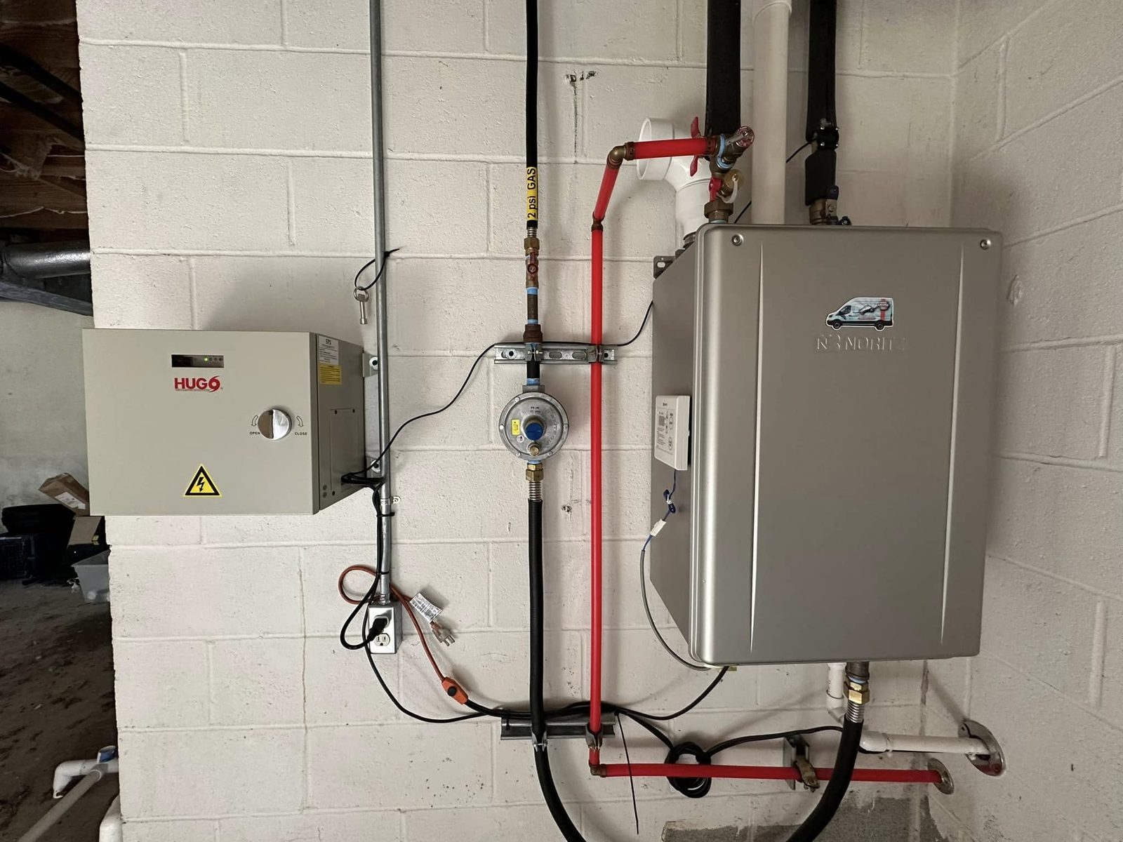 Completed Noritz tankless water heater installation with battery backup